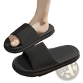 Black rubber unisex ribbed anti slip eva house slippers with textured sole shown from the back side