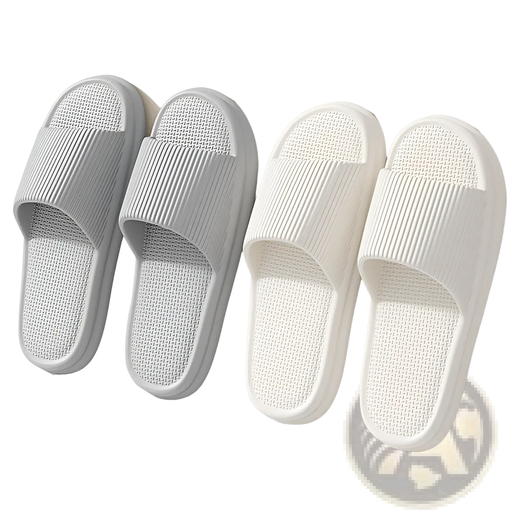 A pair of unisex ribbed anti slip EVA house slippers in soft gray and white with textured slip-on mesh sole