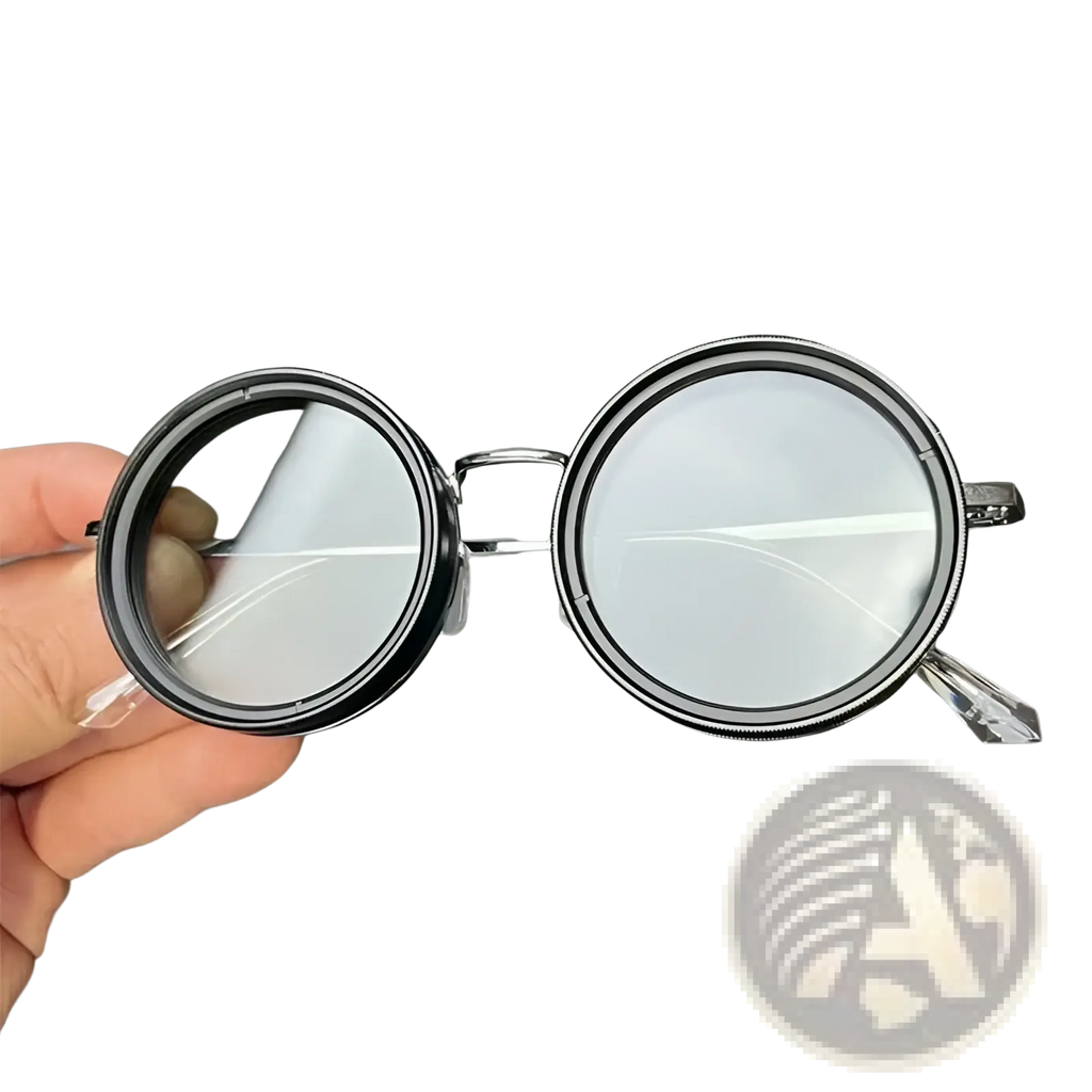 Black-framed unisex round uv resistant sunglasses with clear lenses and metallic bridge and frames