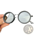 Black-framed unisex round uv resistant sunglasses with clear lenses and metallic bridge and frames
