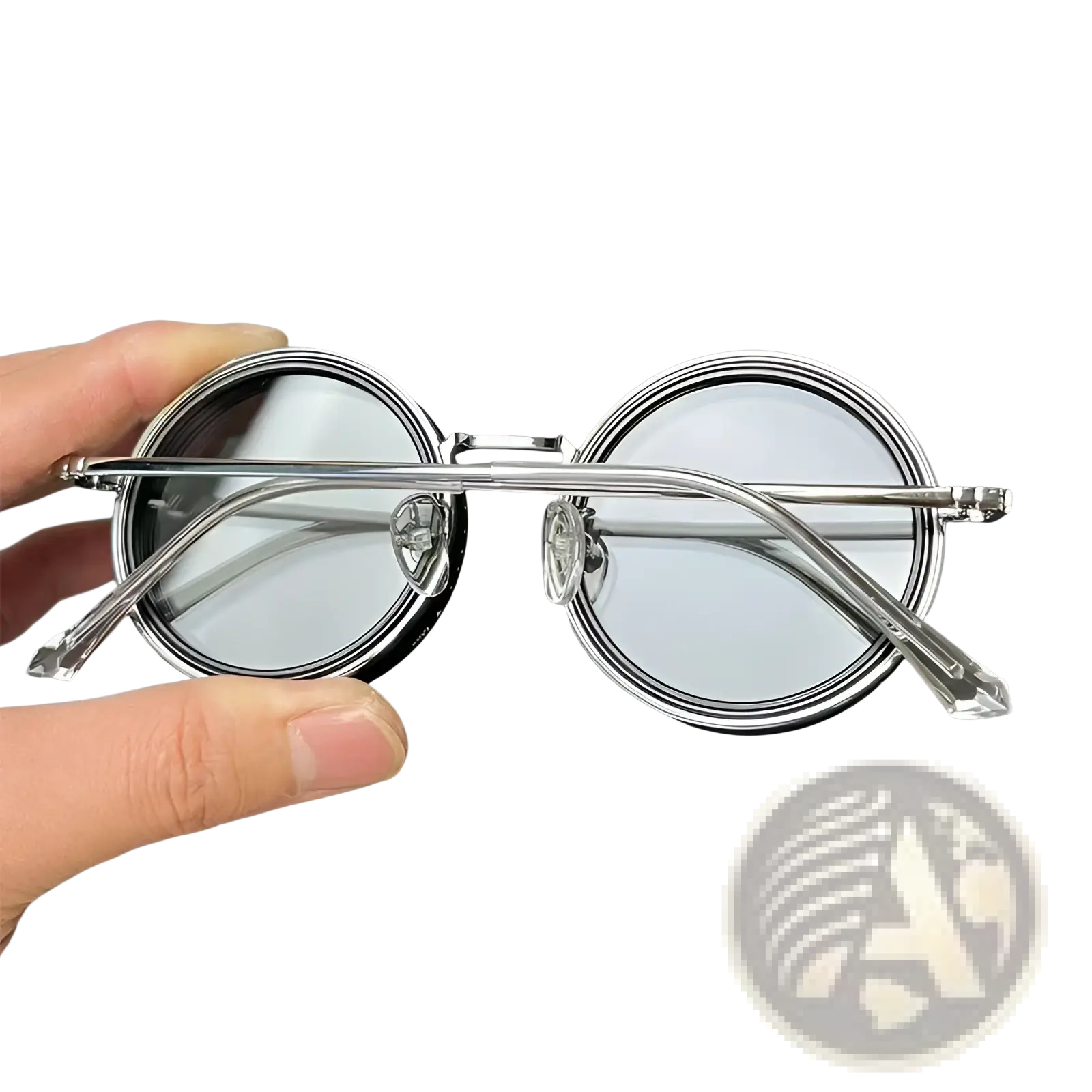 Unisex round uv resistant sunglasses with silver metallic frames mirrored lenses and clear temple tips