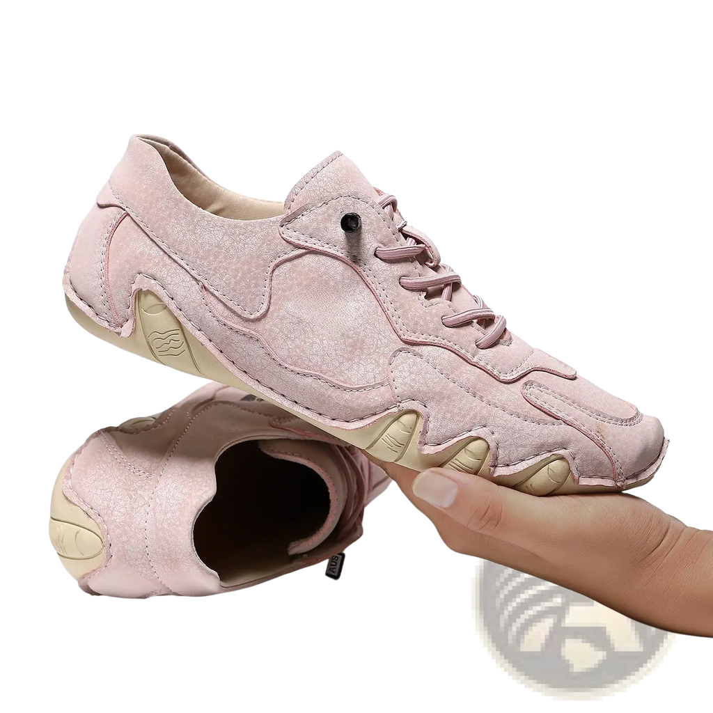 Unisex suede casual sneakers in pink with unique wavy rubber soles and beige outsole for everyday wear