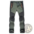 Unisex tactical outdoor hiking pants in olive and black paneling with orange zipper accents for durability and style