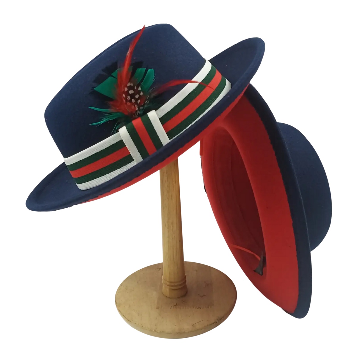 Navy blue unisex woolen felt fedora hat with red and green striped ribbon band and decorative feather accent