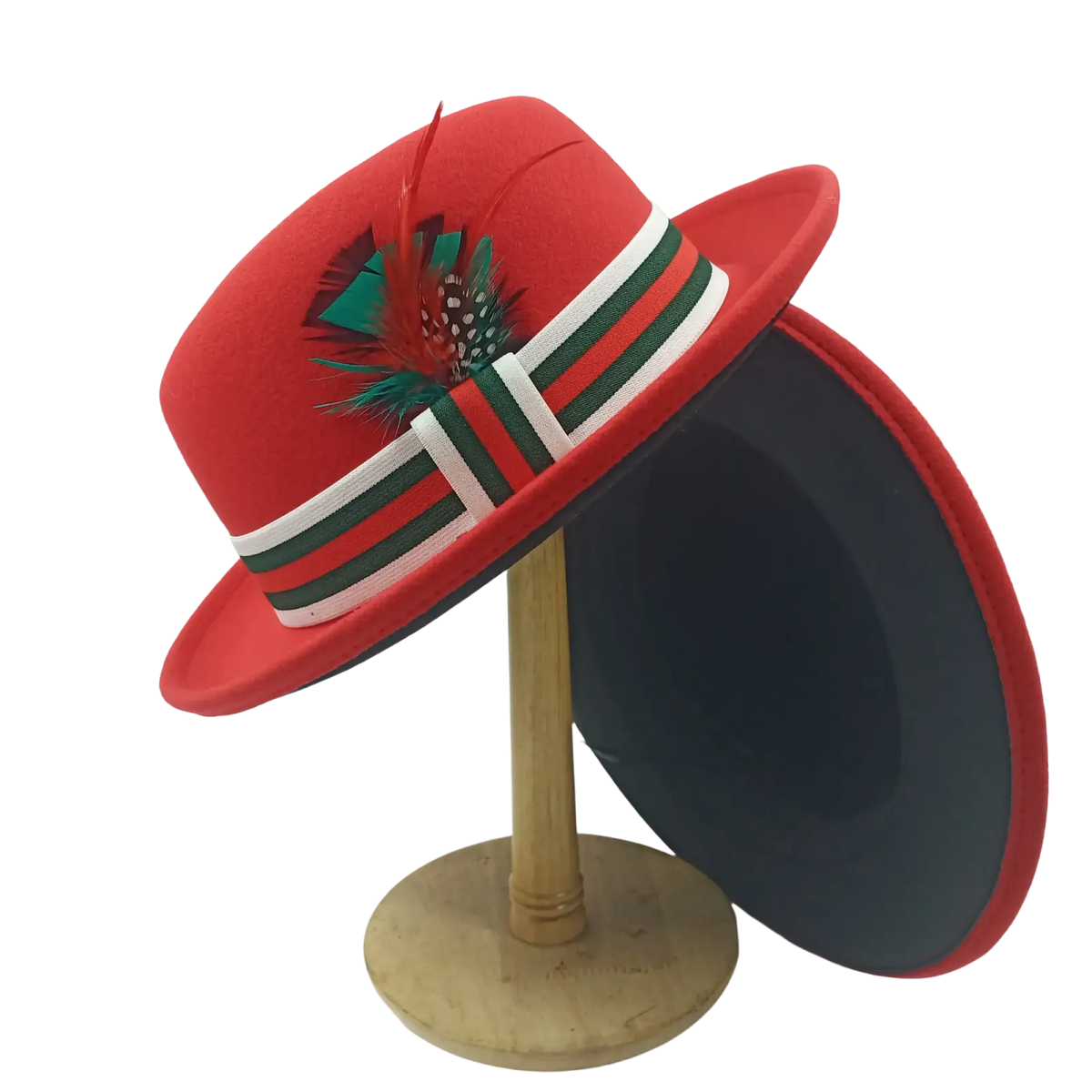 A vibrant red unisex woolen felt fedora hat with a decorative striped band and ornate feather accent