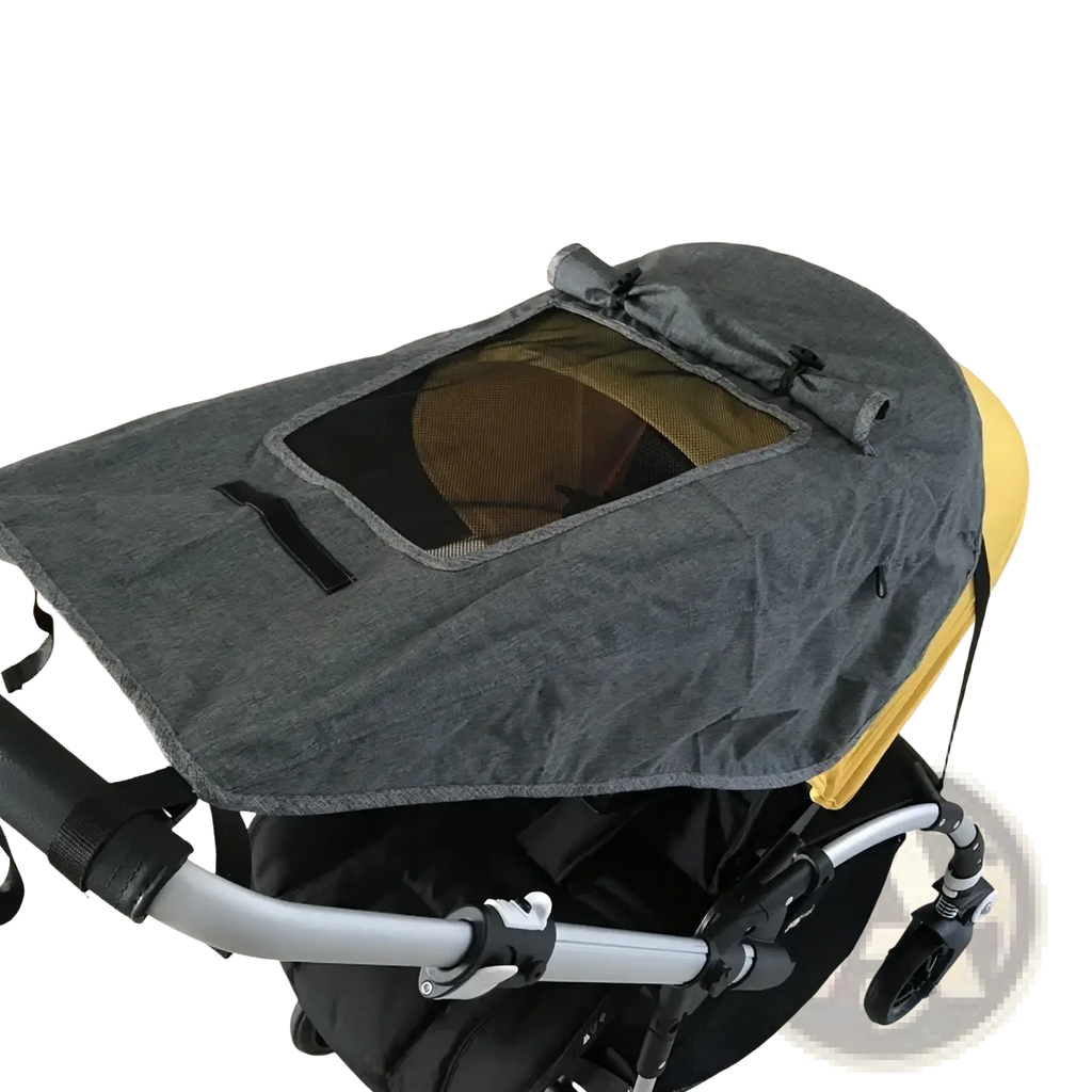 Gray fabric sunshade with mesh window and black trim for universal baby stroller uv protection canopy shown from the back side