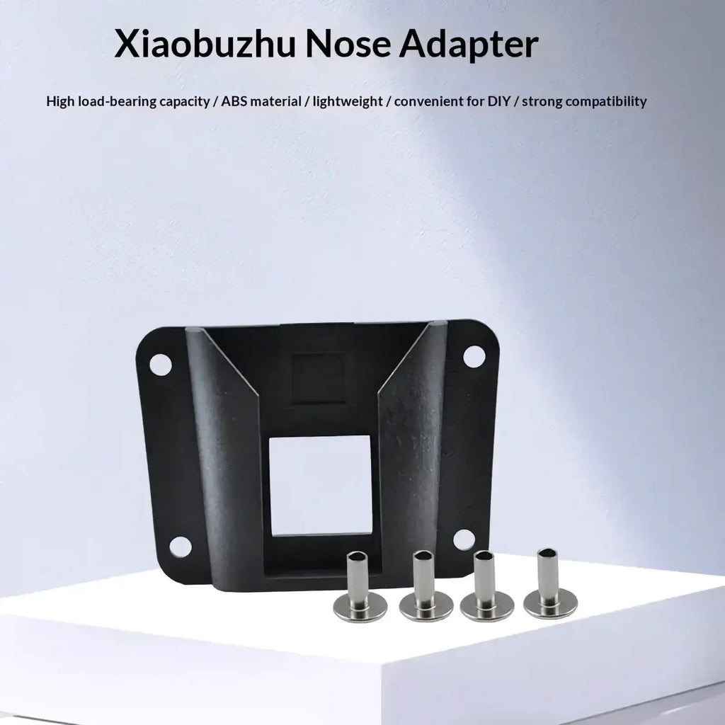 Black abs plastic nose adapter with four mounting holes and silver fasteners for universal folding bike bag mount kit