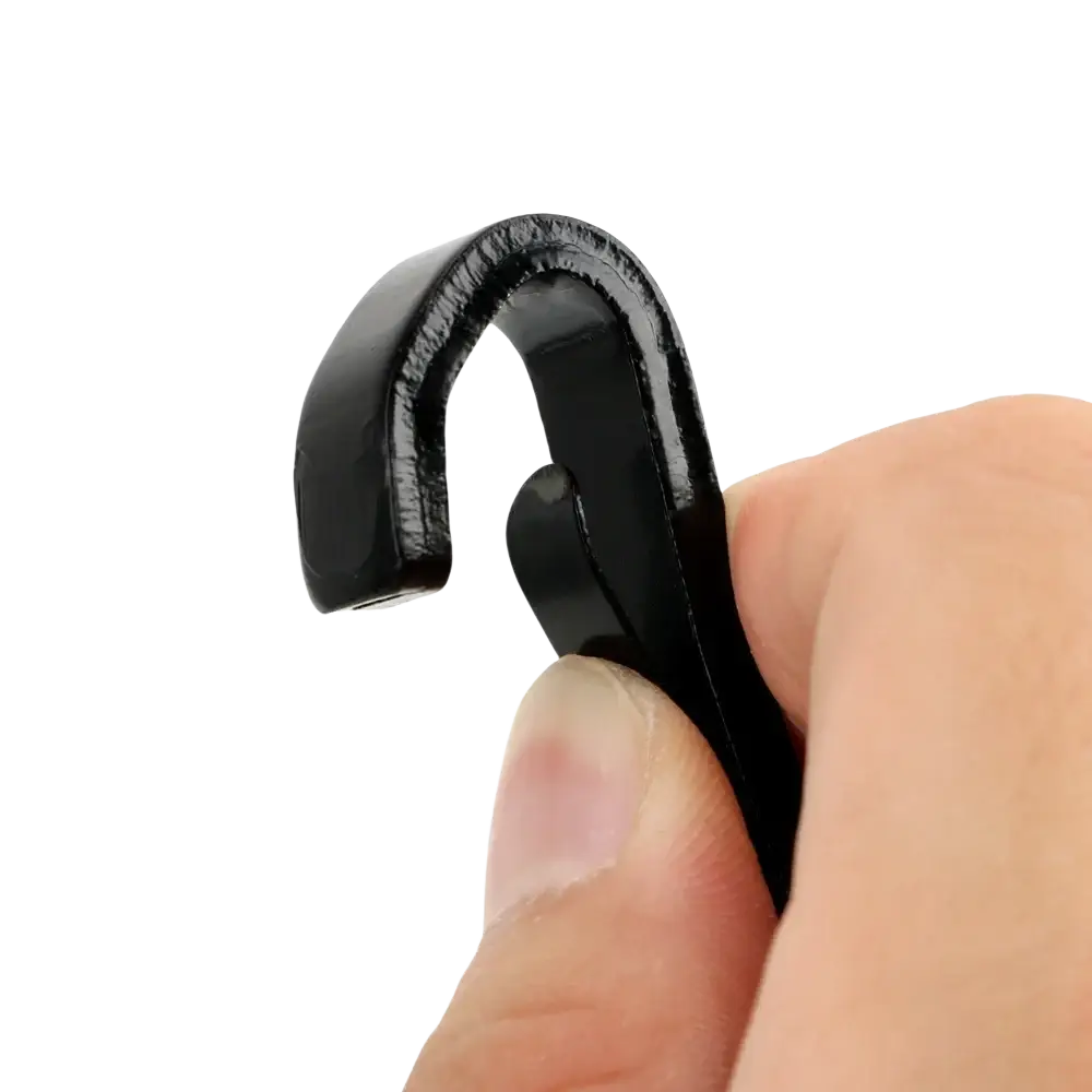 Black plastic universal Isofix car seat belt extender hook with smooth glossy finish and rounded edges