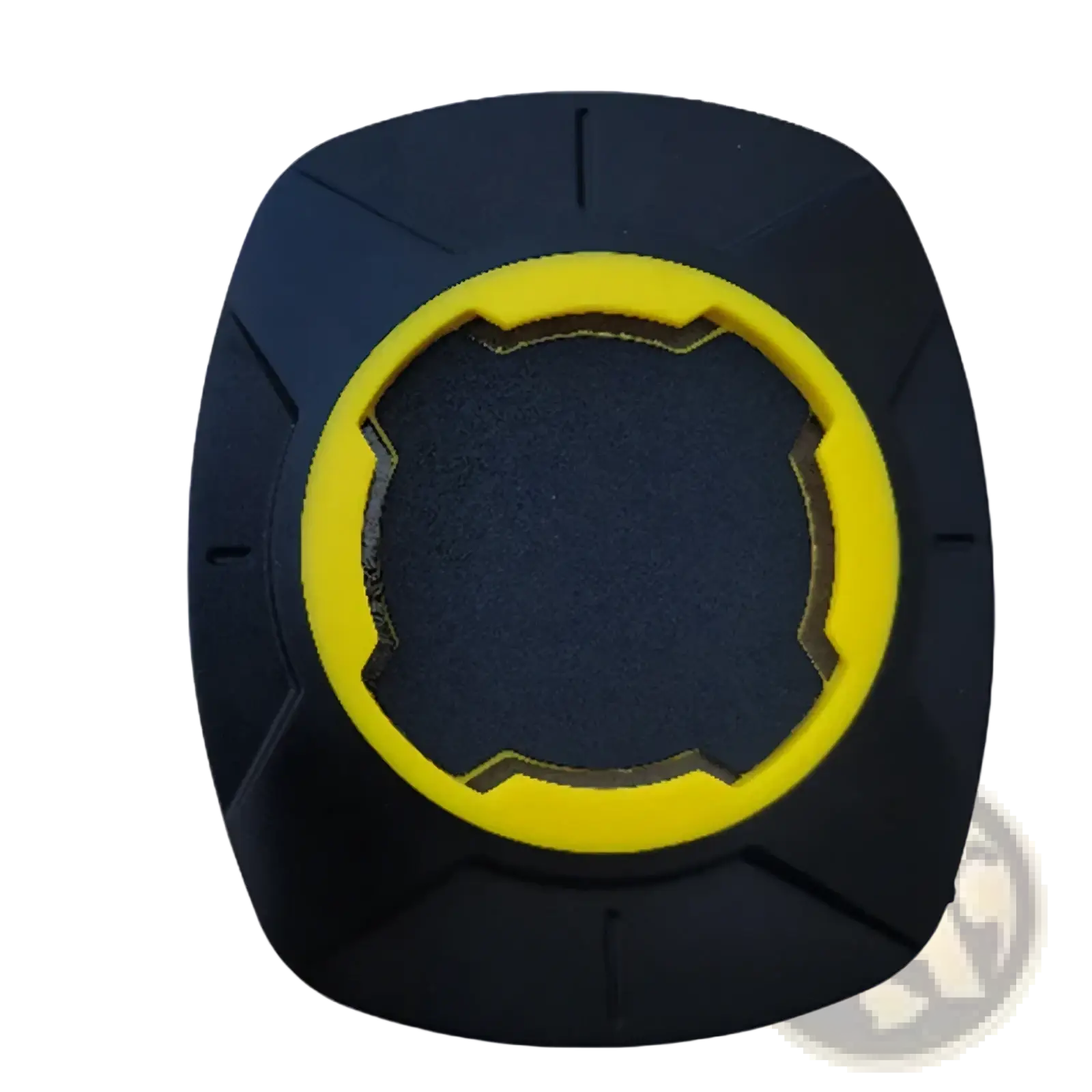 Black and yellow rubber universal phone mount patch for bicycle handlebars with textured grip surface