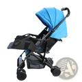 Blue and black foldable stroller with canopy mesh storage compartments and four wheels showing universal stroller extension footrest