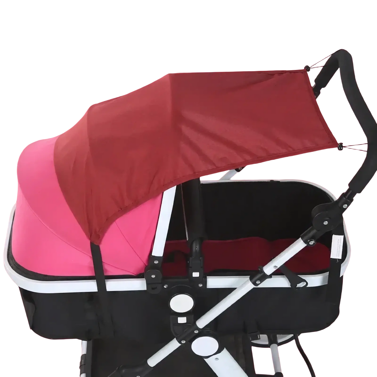 Red fabric universal stroller sun shade upf50 canopy attached to black and white stroller frame in front view