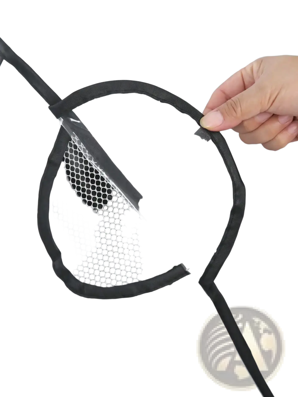Universal transparent baby stroller rain cover made of clear plastic with black trim and a circular mesh pocket