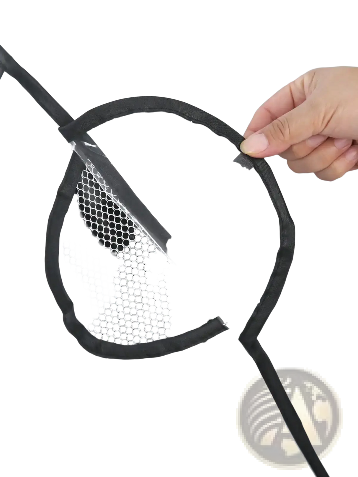 Universal transparent baby stroller rain cover made of clear plastic with black trim and a circular mesh pocket