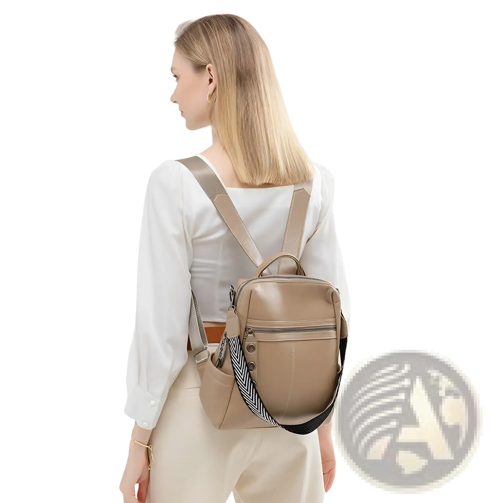 Beige urban faux leather backpack with herringbone striped shoulder strap and front zipper pocket