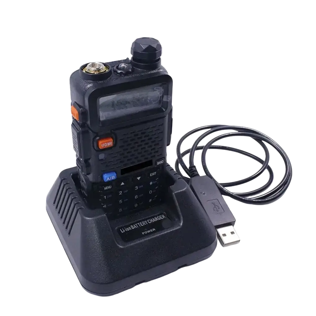 Black handheld baofeng uv-5r two-way radio with orange and blue buttons on usb battery charger base for uv5r