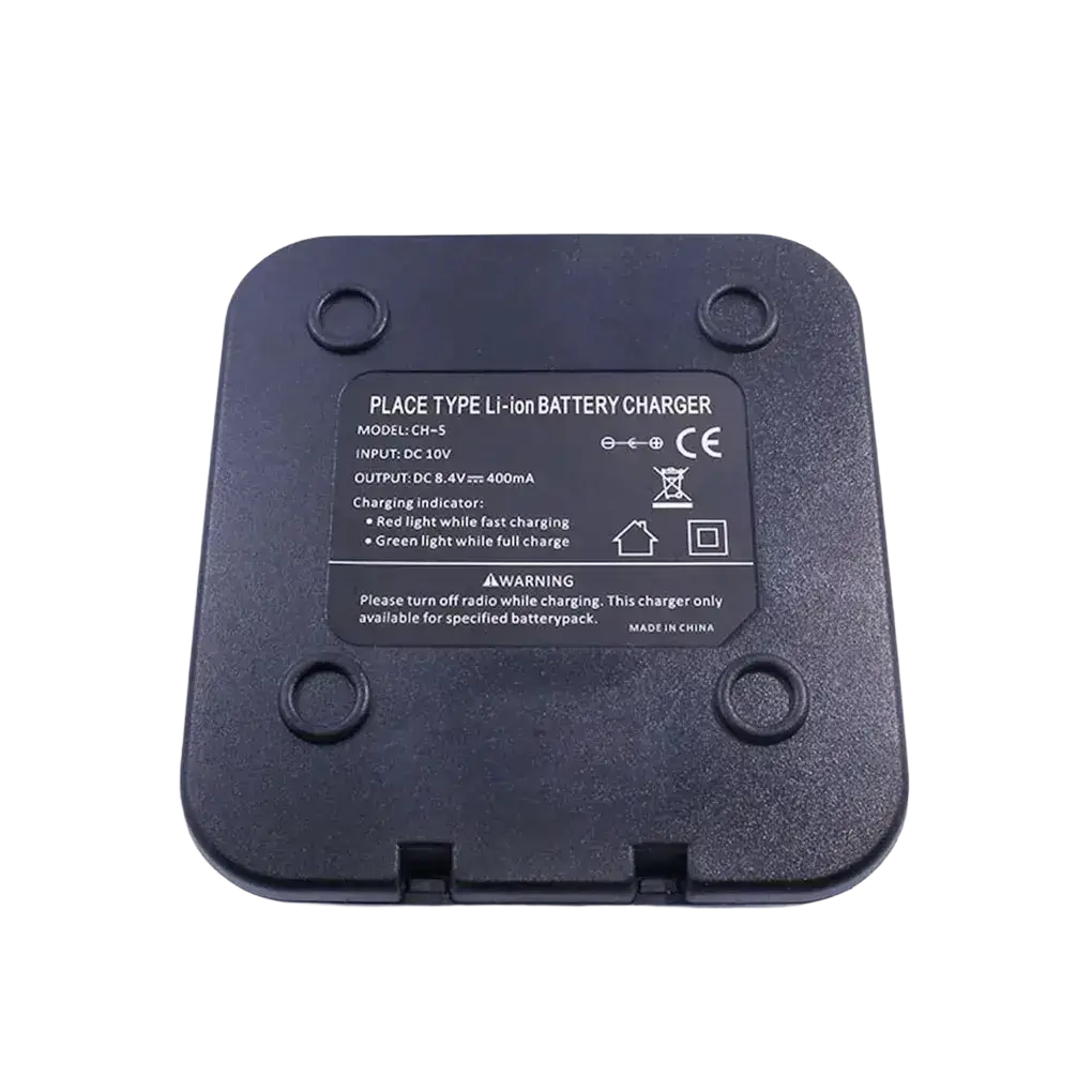 Black plastic USB battery charger with rounded corners and four circular indentations for baofeng uv-5r batteries