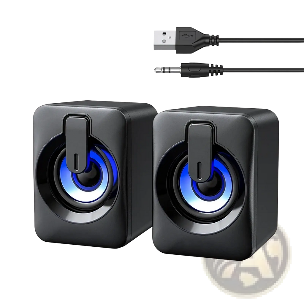 Black cube shaped usb computer speakers with led lights featuring glowing blue circular rings around drivers