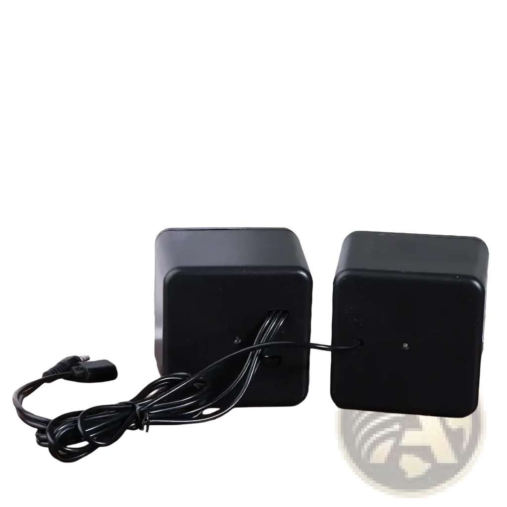 Black cube-shaped usb computer speakers with matte finish featuring led stereo audio and coiled usb cable connection