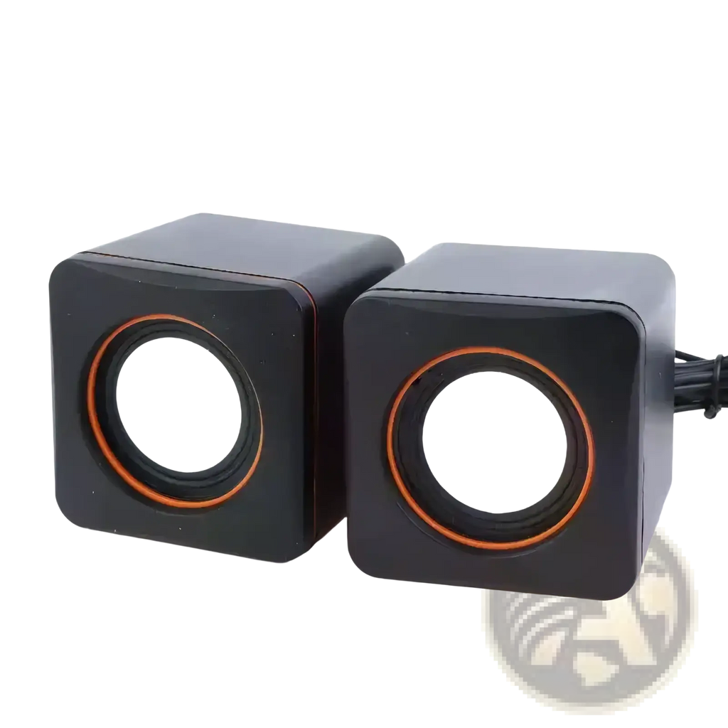 Black cube-shaped usb computer speakers with orange-rimmed circular drivers and built-in microphone for desktop use
