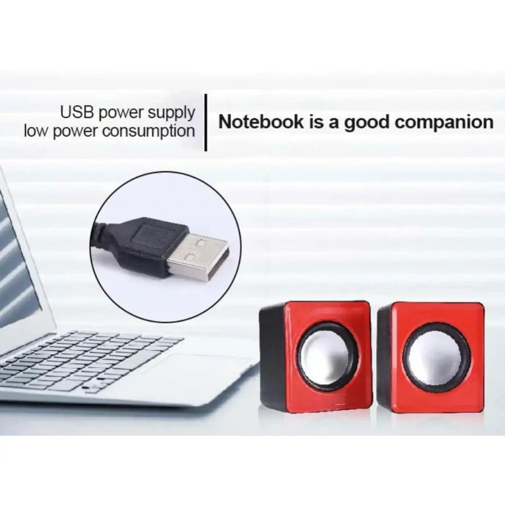 Red and black cube-shaped USB mini computer speakers with silver circular drivers for desktop stereo audio system