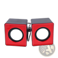 Red and black usb mini desktop stereo computer speakers with circular white drivers for audio playback