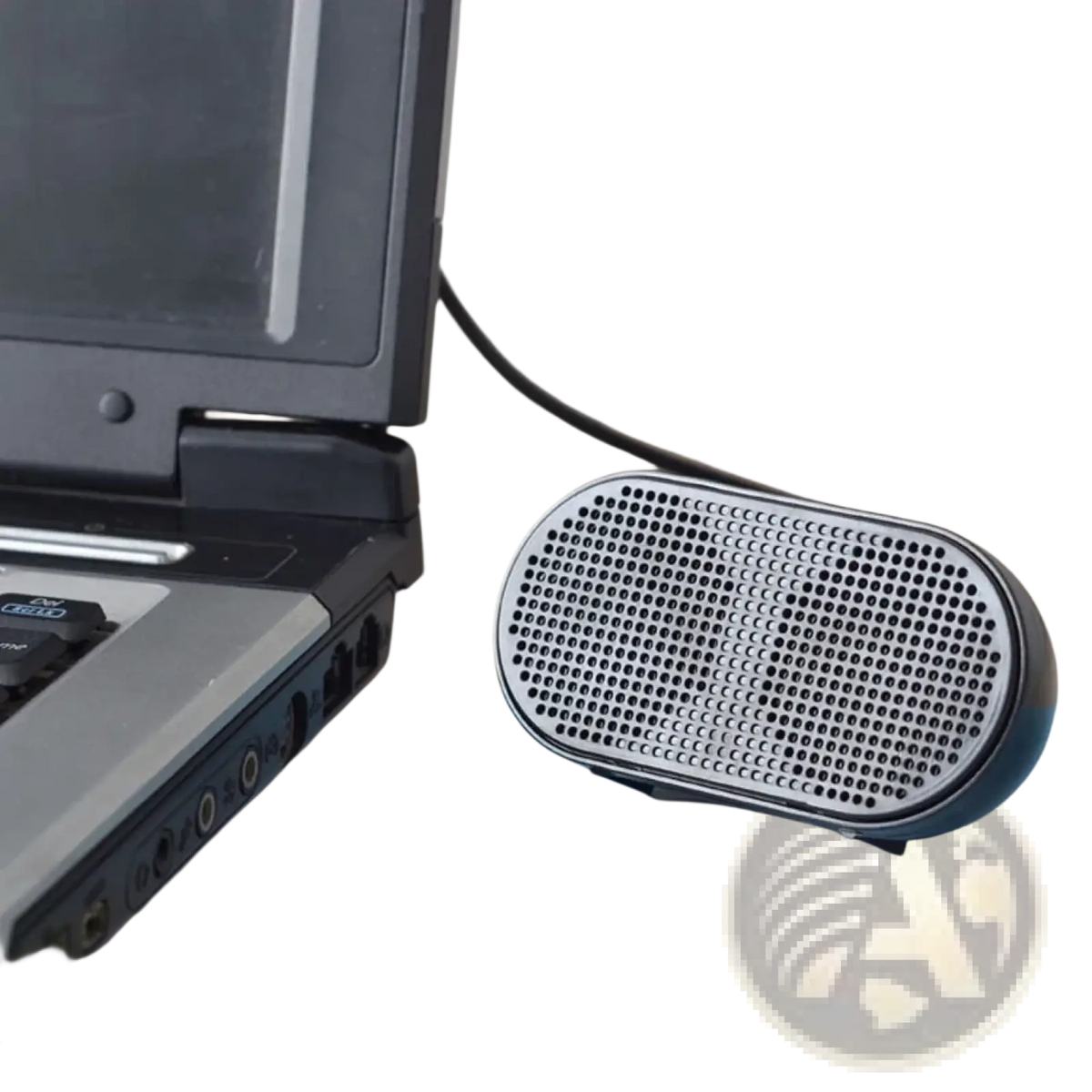 Silver oval-shaped usb mini laptop speaker with perforated grille and black trim portable computer soundbar