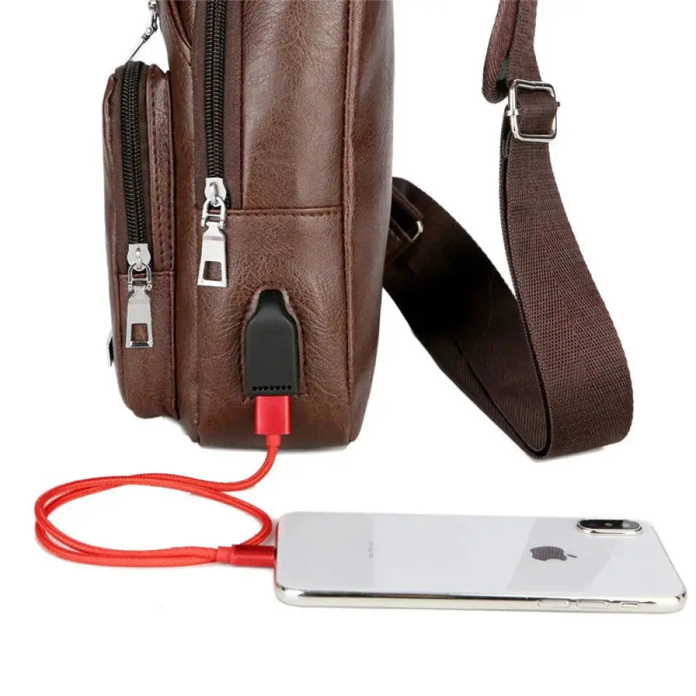 Brown faux leather usb charging chest messenger bag with built-in usb port and matching crossbody strap