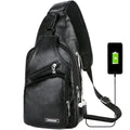 Black faux leather crossbody bag with multiple zippers and built-in usb charging port for hands-free use