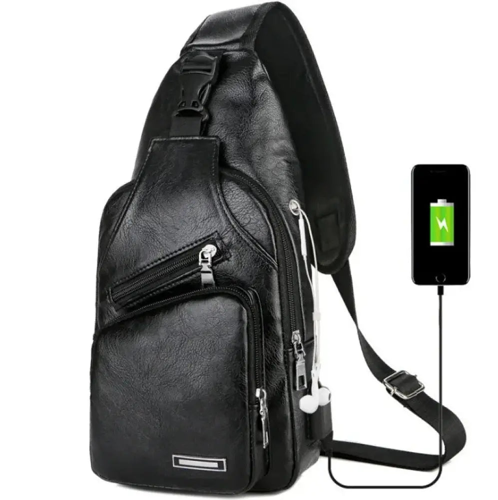 Black faux leather crossbody bag with multiple zippers and built-in usb charging port for hands-free use
