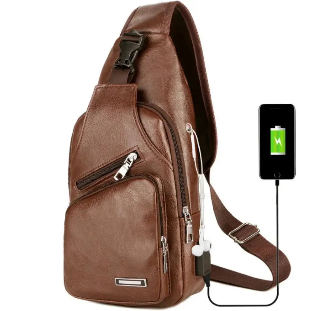 Brown faux leather usb charging chest messenger bag with multiple zippers and built-in usb charging port