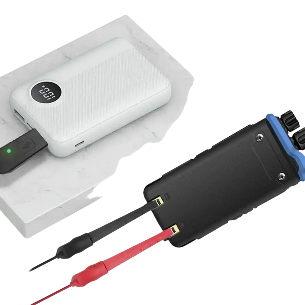 White textured portable charger with digital display and usb port connected to black device via usb walkie talkie charger cable