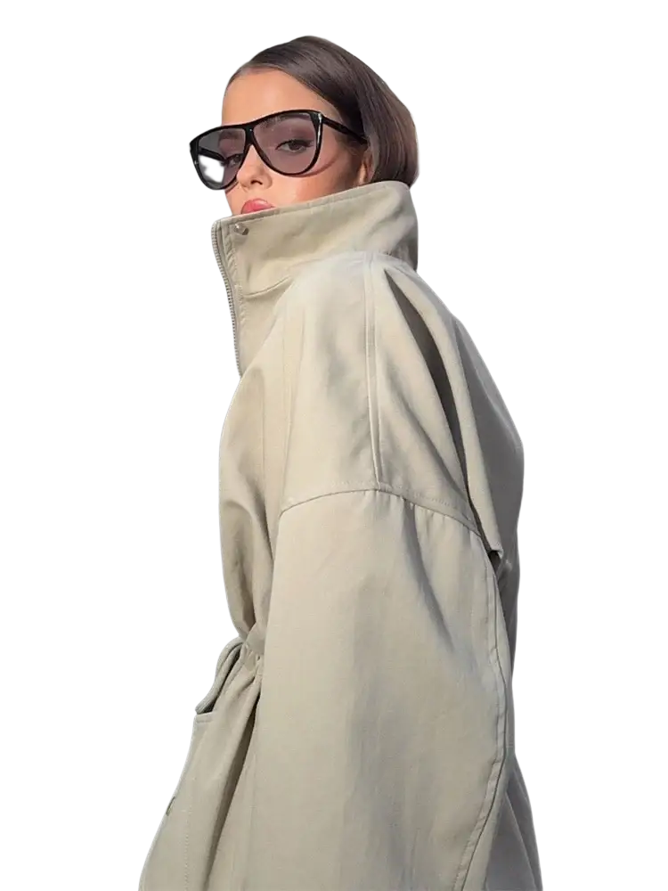 Beige oversized utility trench coat with high collar and drawstring waist ideal for stylish outerwear