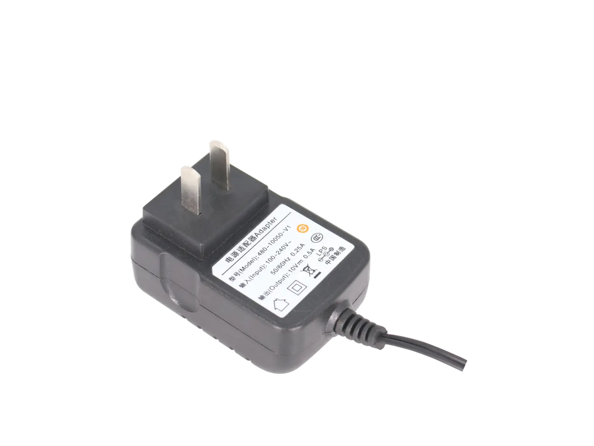 Black plastic uv-5r desktop charger with two-prong plug and coiled power cord for baofeng walkie talkie