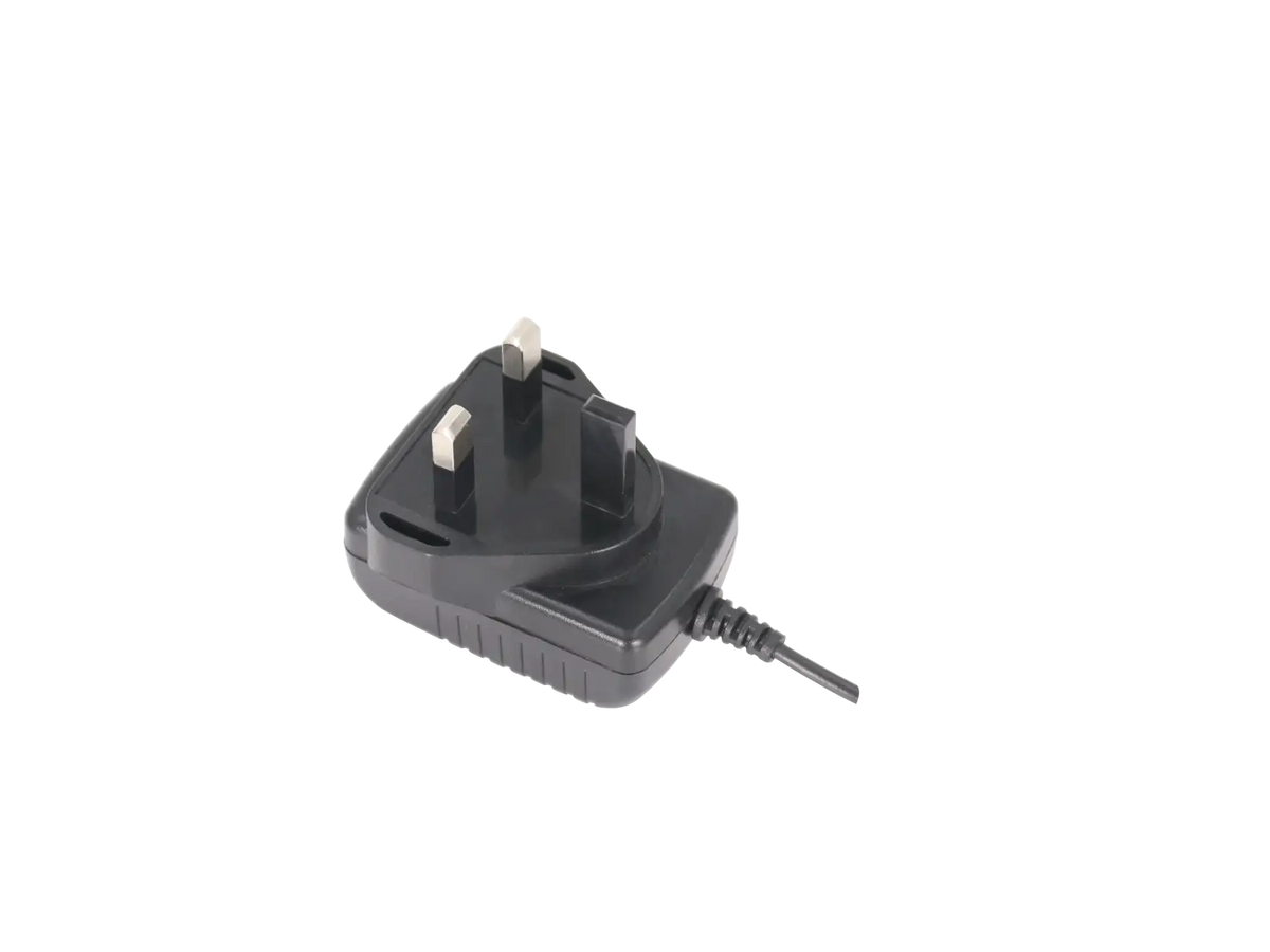 Black plastic uv-5r desktop charger with uk three-prong plug and coiled cable for baofeng walkie talkie