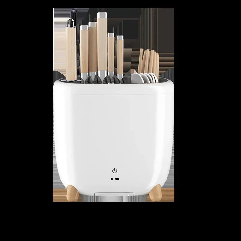 White ceramic 360 rotating ceramic cutlery drainer with wooden feet and power button on the front side