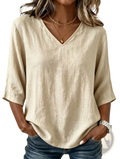Beige linen v-neck casual top with three-quarter sleeves suitable for everyday wear