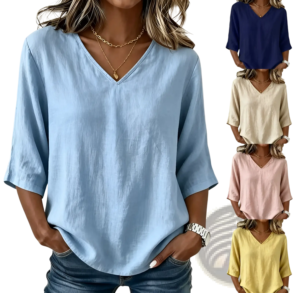 Light blue v-neck casual top with three-quarter sleeves made of soft textured fabric