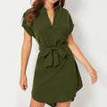 Emerald green v neck short sleeve belted wrap dress in olive green with tied waistband and short sleeves