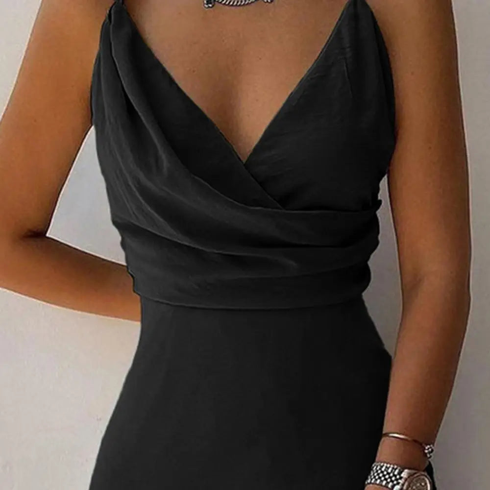 A sleek black satin v neck summer maxi dress with a deep v-neckline and draped bodice