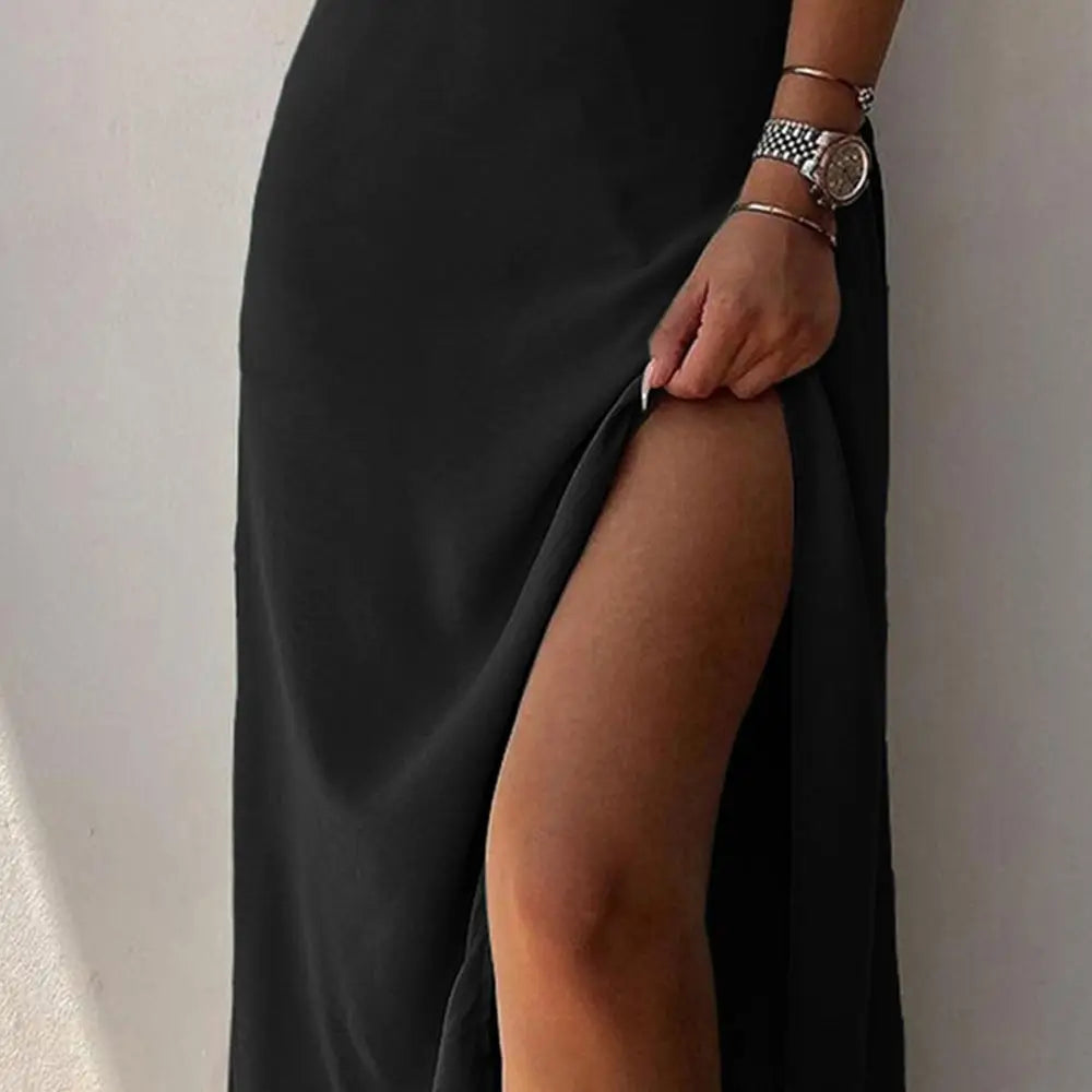 Black satin maxi skirt with high slit featuring v neck design suitable for summer dress occasions