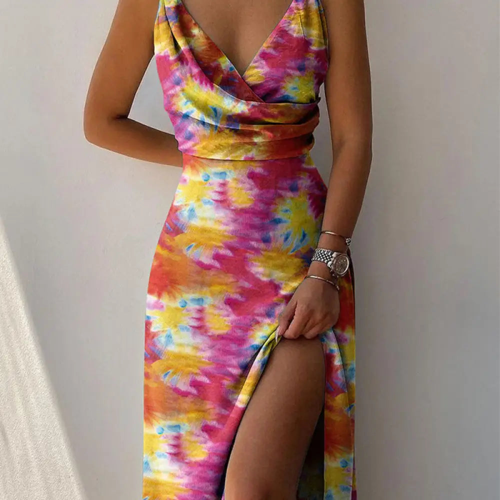 A vibrant satin v neck high slit summer maxi dress in pink yellow and blue tie dye slip style