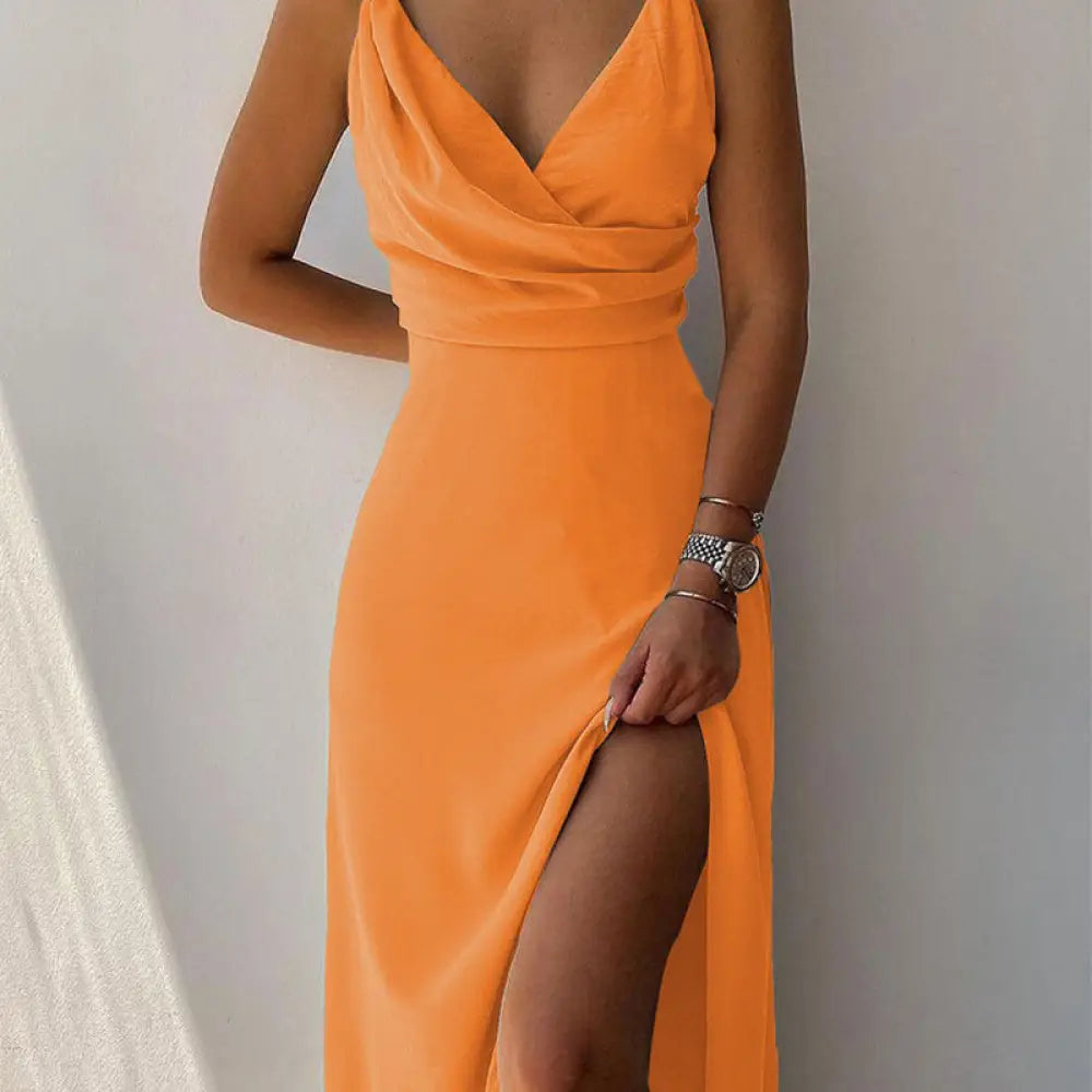 A vibrant orange satin v neck summer maxi dress with a high slit and elegant slip design