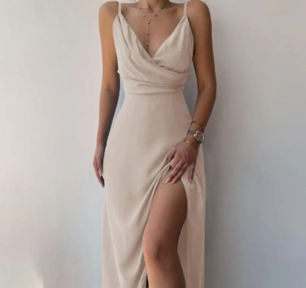 Beige satin v neck summer maxi dress with deep v neckline and high slit for elegant warm weather wear