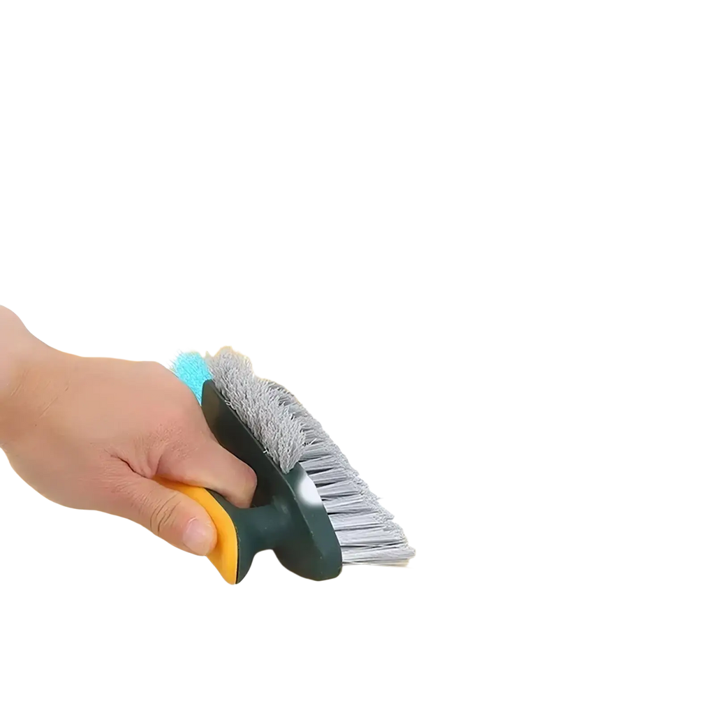 A dual-sided v-shaped tile and crevice cleaning brush with a green and yellow handle featuring gray and blue-tipped bristles
