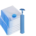 Blue plastic vacuum pump with matching cap and handle for use with baby clothes vacuum storage bags