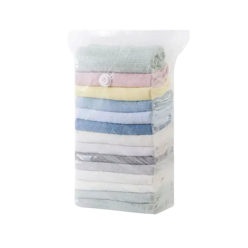 Clear plastic vacuum storage bags with white button seal storing pastel towels for bags store clothes and quilts