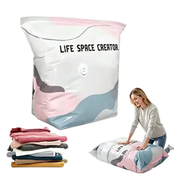 A pink gray and white inflatable vacuum storage bag with life space creator label made of pa+pe material