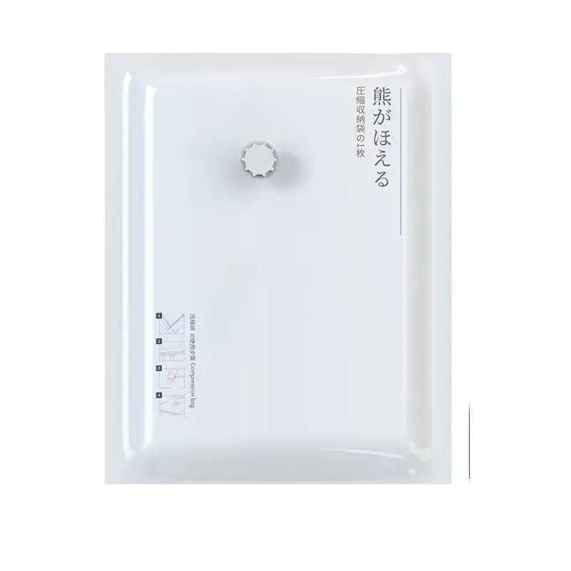 White rectangular vacuum storage bag with silver star valve and japanese text made of pa+pe composite material