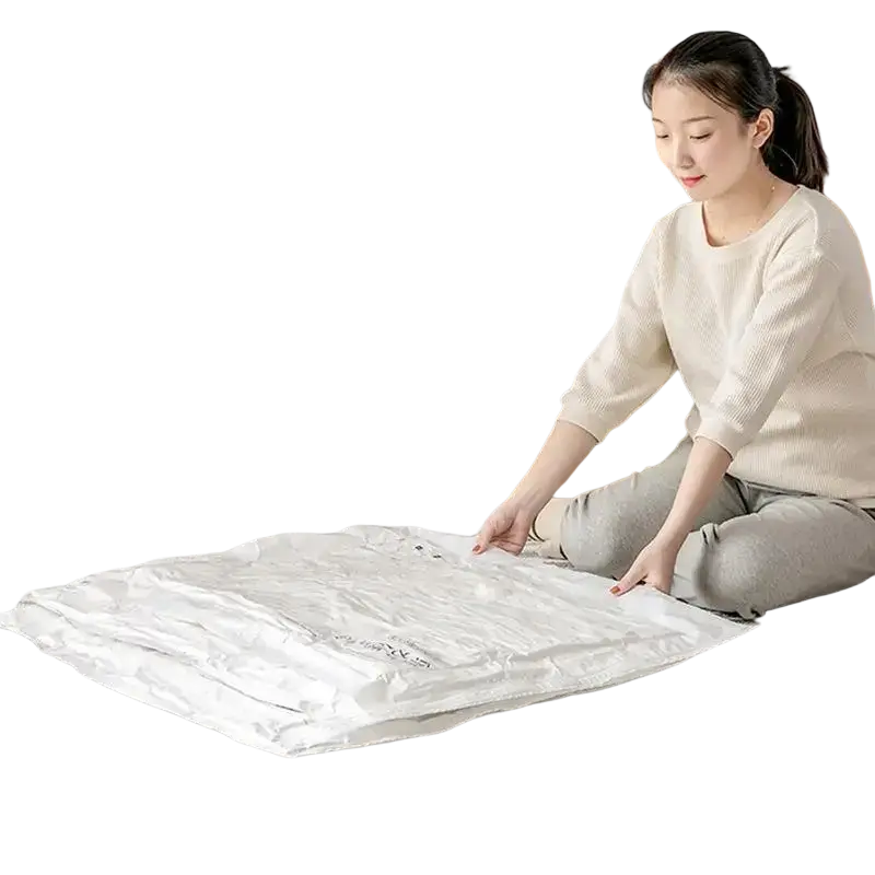 White vacuum storage bag with transparent zipper and printed text made of pa+pe composite material for space saving