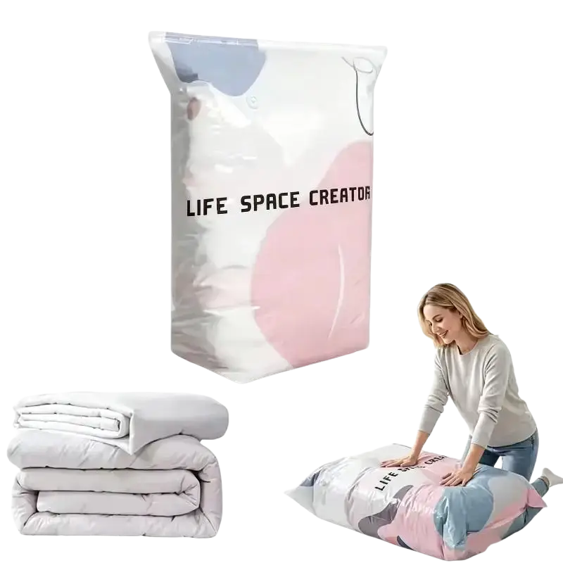 A transparent pink and gray pa+pe vacuum storage bag with abstract pattern labeled life space creator for reusable space saving